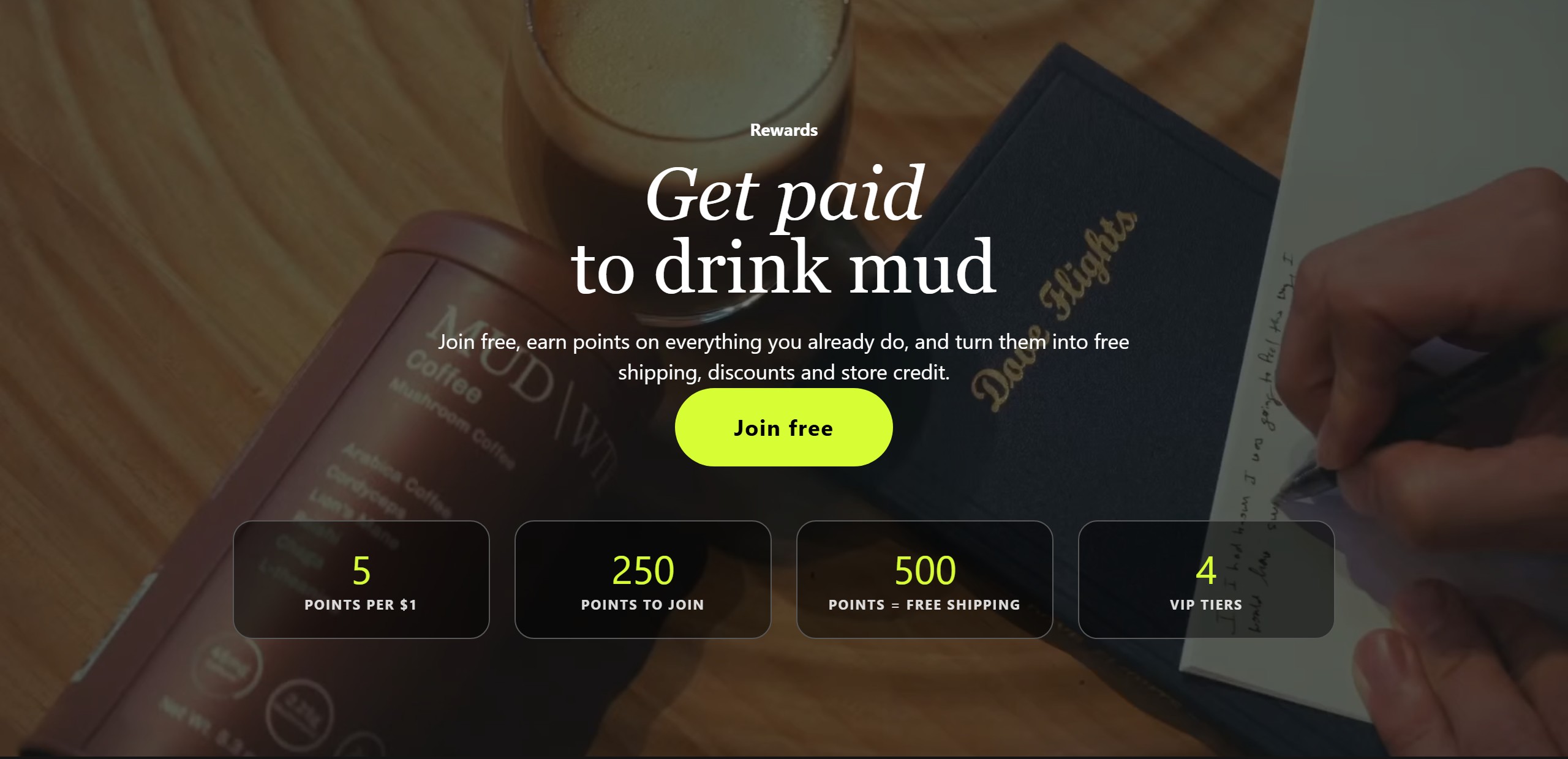 A second custom loyalty page in a dark treatment: a video hero with the points headline and four headline stats.